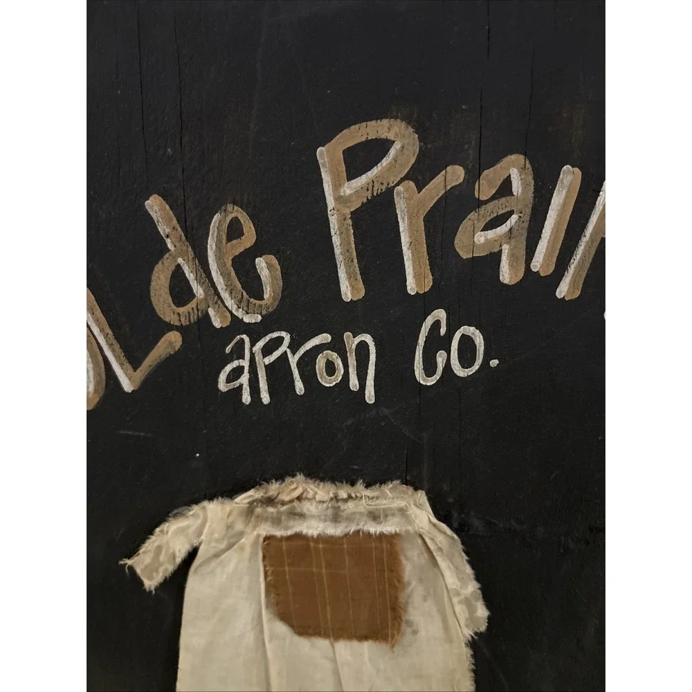 Primitive Folk Art Ole Prairie Apron Co Wood Wall Sign 16